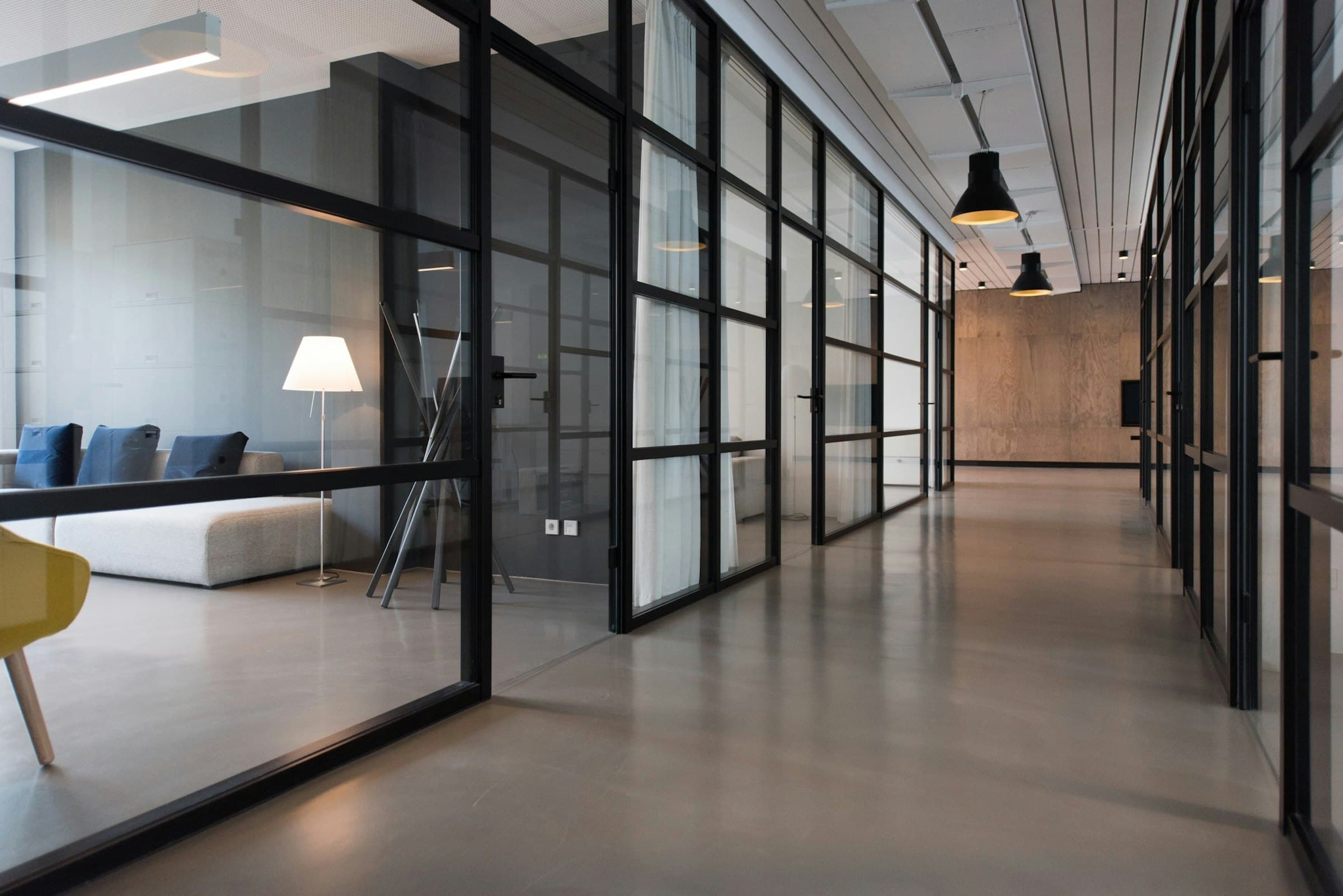 Finished office with glass rooms and clean finishes